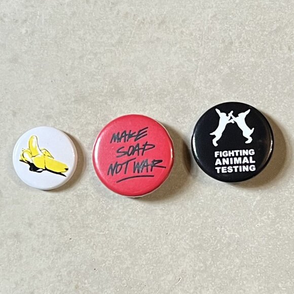 3 RARE LUSH Staff Pins: Gorilla Perfume/Make Soap Not War/Fight Animal Testing - Picture 1 of 2